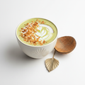 Coconut Matcha latte with toasted coconut flakes